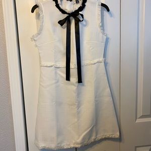 White dress with black tie